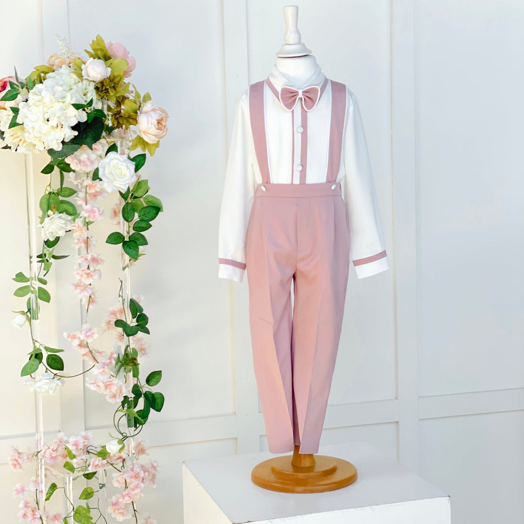 pink dress shirt with suspenders Young man in pink shirt and suspenders stands by tree. photo Free Fashion Image on Unsplash